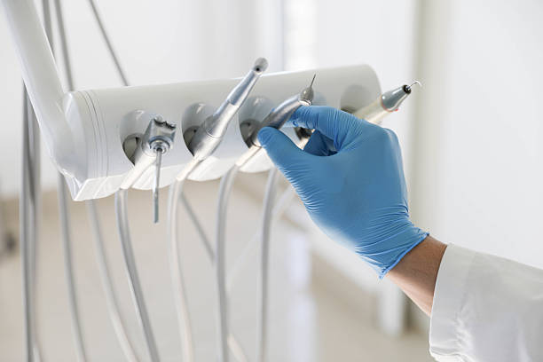 Professional Dental Implants technician working in Caddo County County, OK